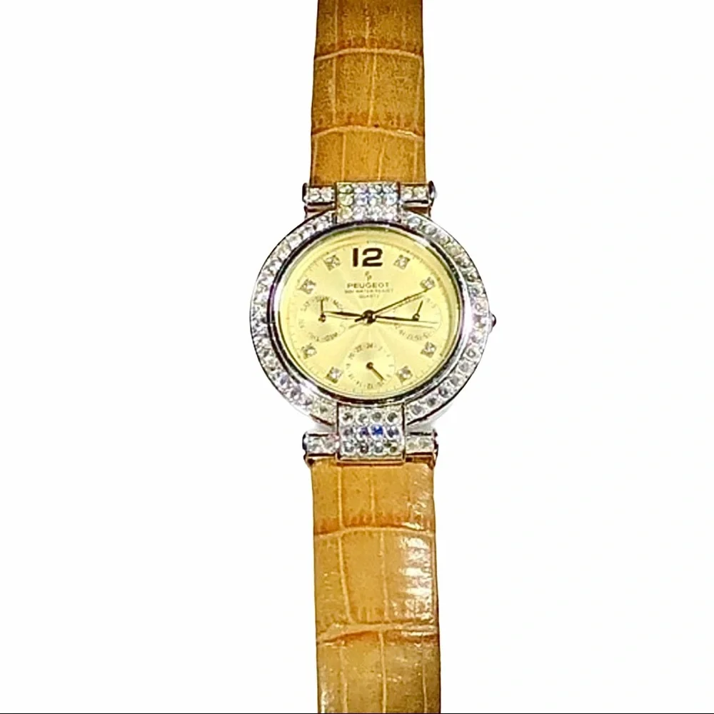 P. PEUGEOT YELLOW FACE & CROCODILE STAMPED BAND WITH CRYSTAL BEZEL WATCH